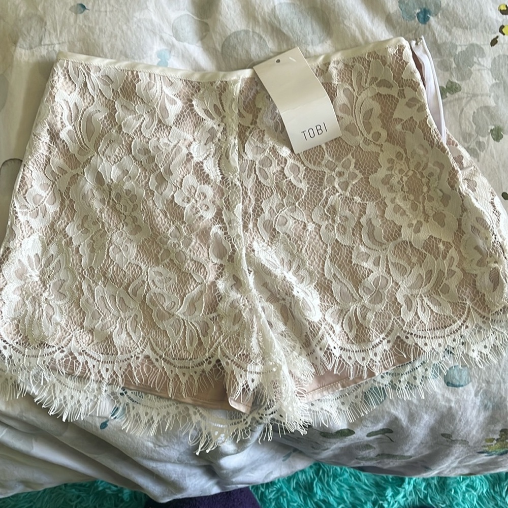 NWT Tobi size 0 shorts.  Zip side, lace overlay